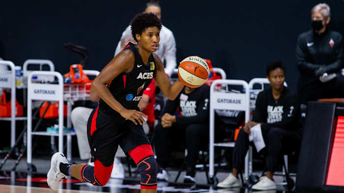 Aces star Angel McCoughty dribbles down the court during a 2020 playoff game